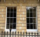 Outside view looking in to a pair of sash windows