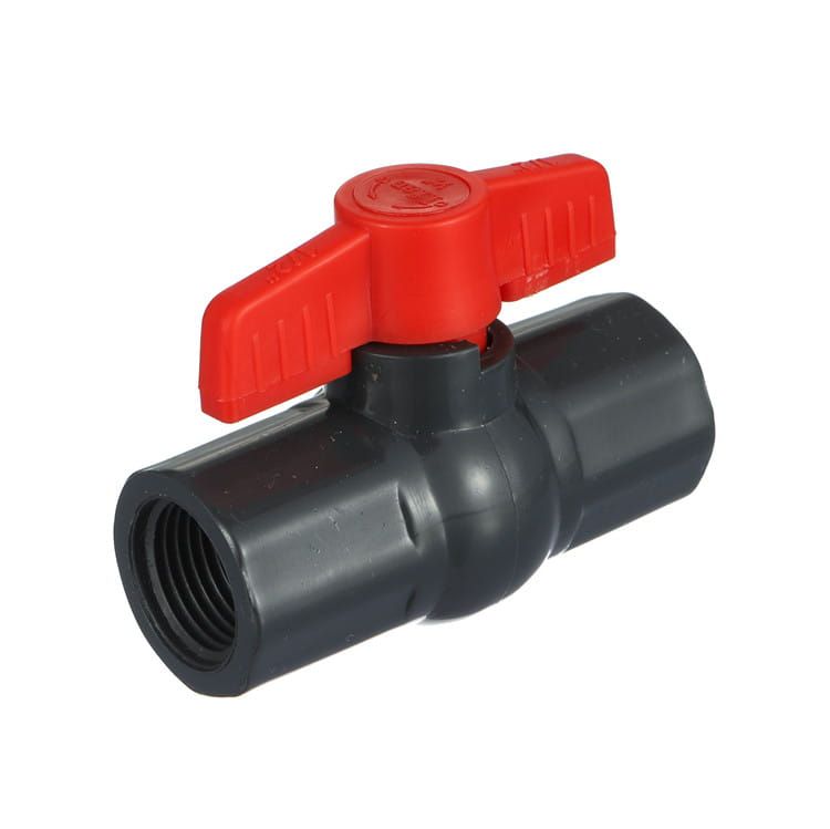 Black PVC ball valve with a red lever handle and female threaded end, the class of plastic valve specified on chemical dosing and water treatment lines