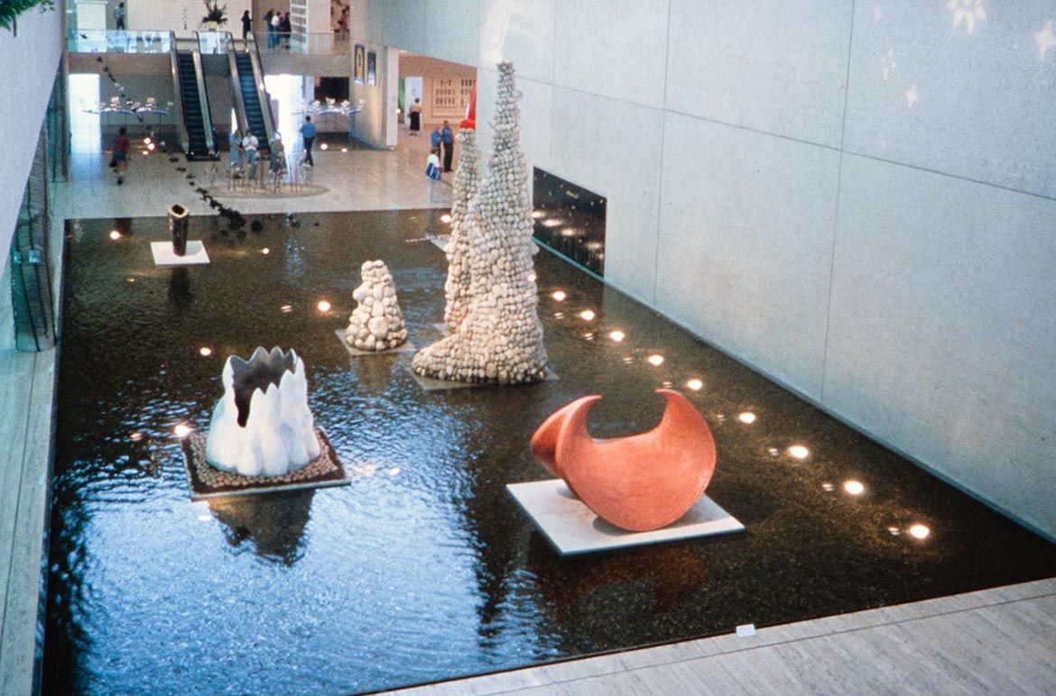 The Waka Collective featuring (left to right) My grandmother was born on a boat 1996 by Bronwynne Cornish, Pumice from the mountains 1993 by Chris Booth, and Kahukura 1995 by Brett Graham / Photograph © QAGOMA