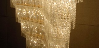 Ai Weiwei, China b.1957 / Boomerang 2006 / Glass lustres, plated steel, electric cables, LED lamps / 700 x 860 x 290cm / Gift of the artist through the Queensland Art Gallery Foundation 2007 / Collection: Queensland Art Gallery | Gallery of Modern Art / © Ai Weiwei