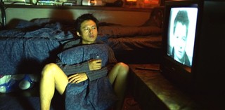 Production still from What Time Is It There? 2001 / Director: Tsai Ming-liang / Image courtesy: Homegreen Films