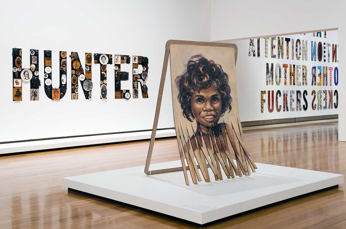 An installation view featuring Tony Albert’s Headhunter 2007 / Purchased with funds provided by the Aboriginal Collection Benefactors’ Group 2007 / Collection: Art Gallery of New South Wales, Sydney / © Tony Albert