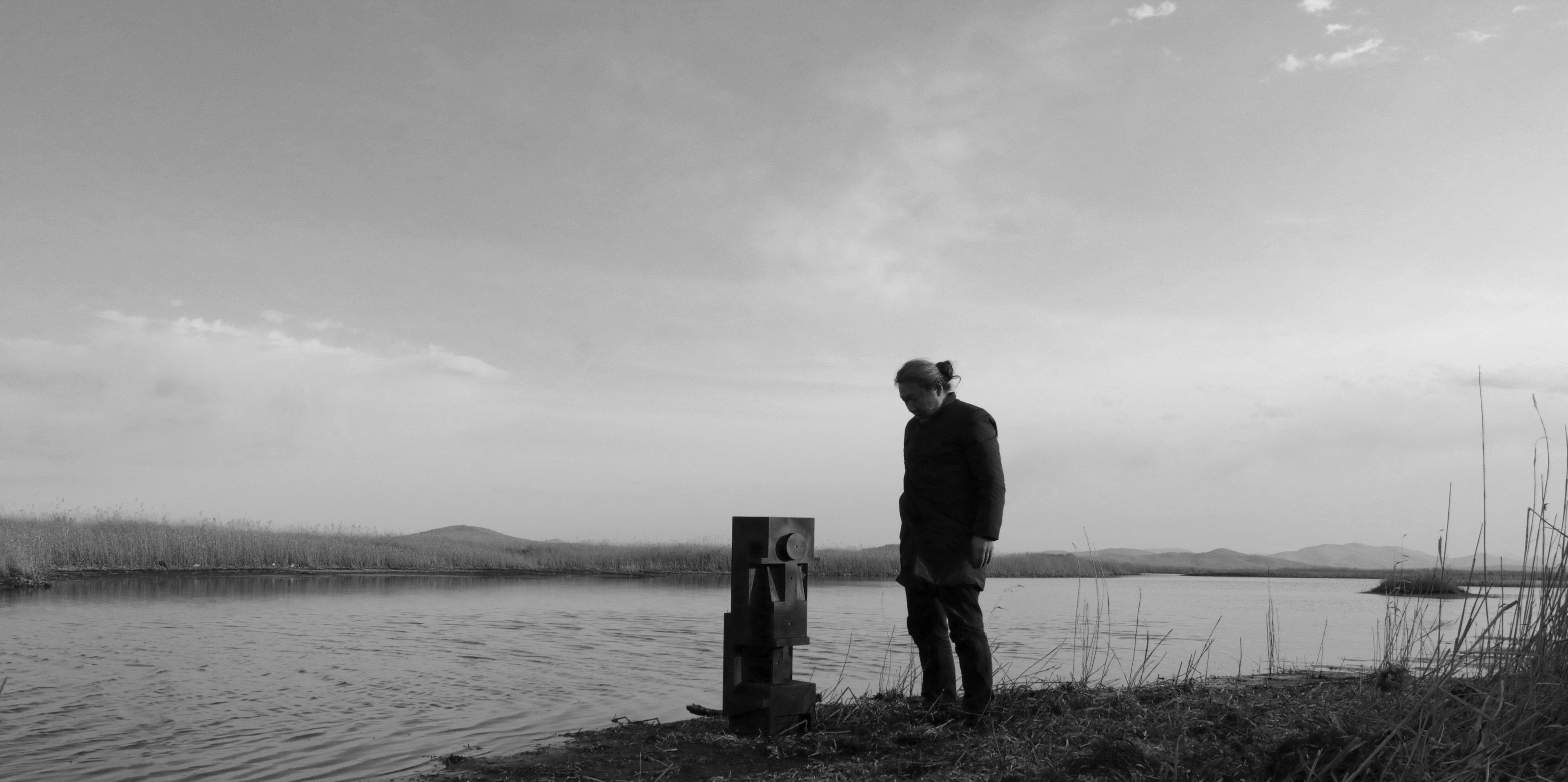 Alexander Ugay / Kyzylorda, Kazakhstan, B.1978 / creating Obscuraton 2022 / Image courtesy: The artist

Obscuraton 2022 / Camera obscura, gelatin silver photographs, inkjet prints, custom plinth / Camera obscura: 90 x 90 x 76cm (installed); 9 inkjet prints: 70 x 80cm (8 prints); 50 x 160cm / Courtesy: The artist / Photograph: Kaelan Burkett