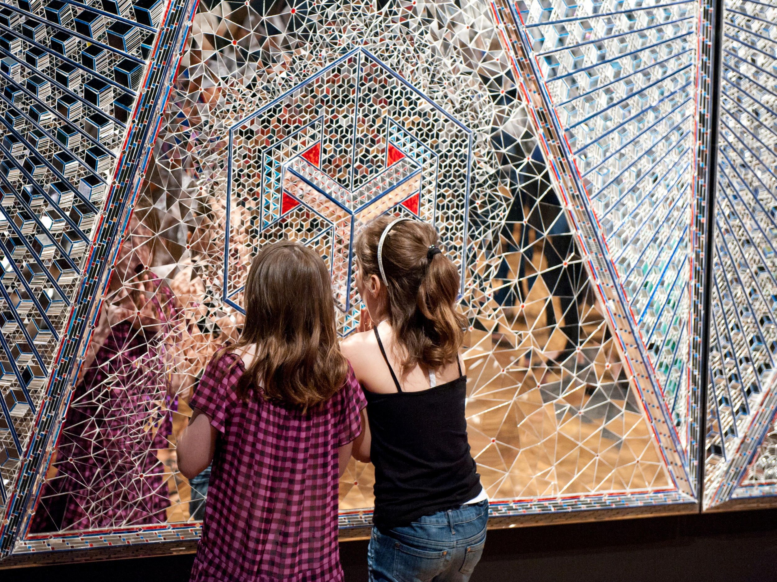 Monir Shahroudy Farmanfarmaian, Iran 1924-2019 / Lightning for Neda 2009 (Installation View) / Mirror mosaic, reverse-glass painting, plaster on wood / Six panels: 300 x 200 x 25cm (each); 300 x 1200 x 25cm (overall) / The artist dedicates this work to the loving memory of her late husband Dr Abolbashar Farmanfarmaian. Purchased 2009. QAG Foundation / Collection: Queensland Art Gallery | Gallery of Modern Art / © Monir Shahroudy Farmanfarmaian Estate | Photography: M Sherwood, QAGOMA
