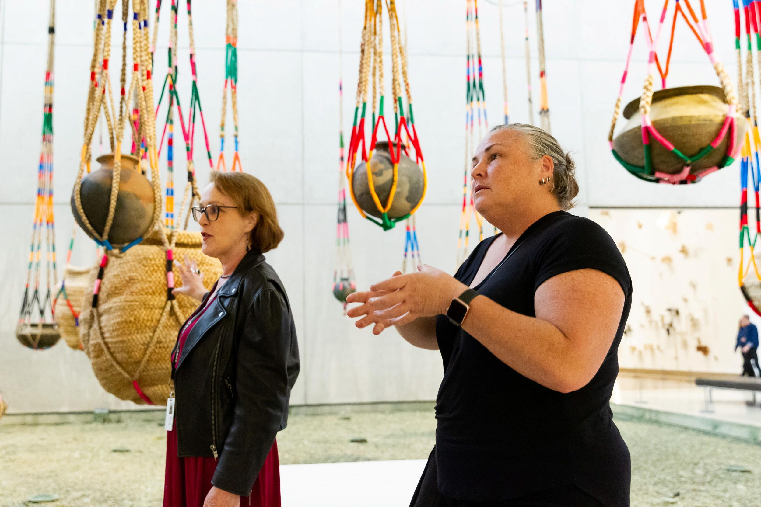 An Auslan interpreter accompanies a volunteer guide on a tour in QAG. Photograph by B. Wagner | QAGOMA

Installation view, APT10, Queensland Art Gallery featuring The fibrous souls 2018-21 by Kamruzzaman Shadhin / Bangladesh, b.1974 / GIDREE BALEE FOUNDATION OF ARTS / Bangladesh, est. 2001 / © Kamruzzaman Shadhin  