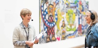 A volunteer guided tour for visitors with hearing loss at the Queensland Art Gallery. Photography: C. Callistemon © QAGOMA