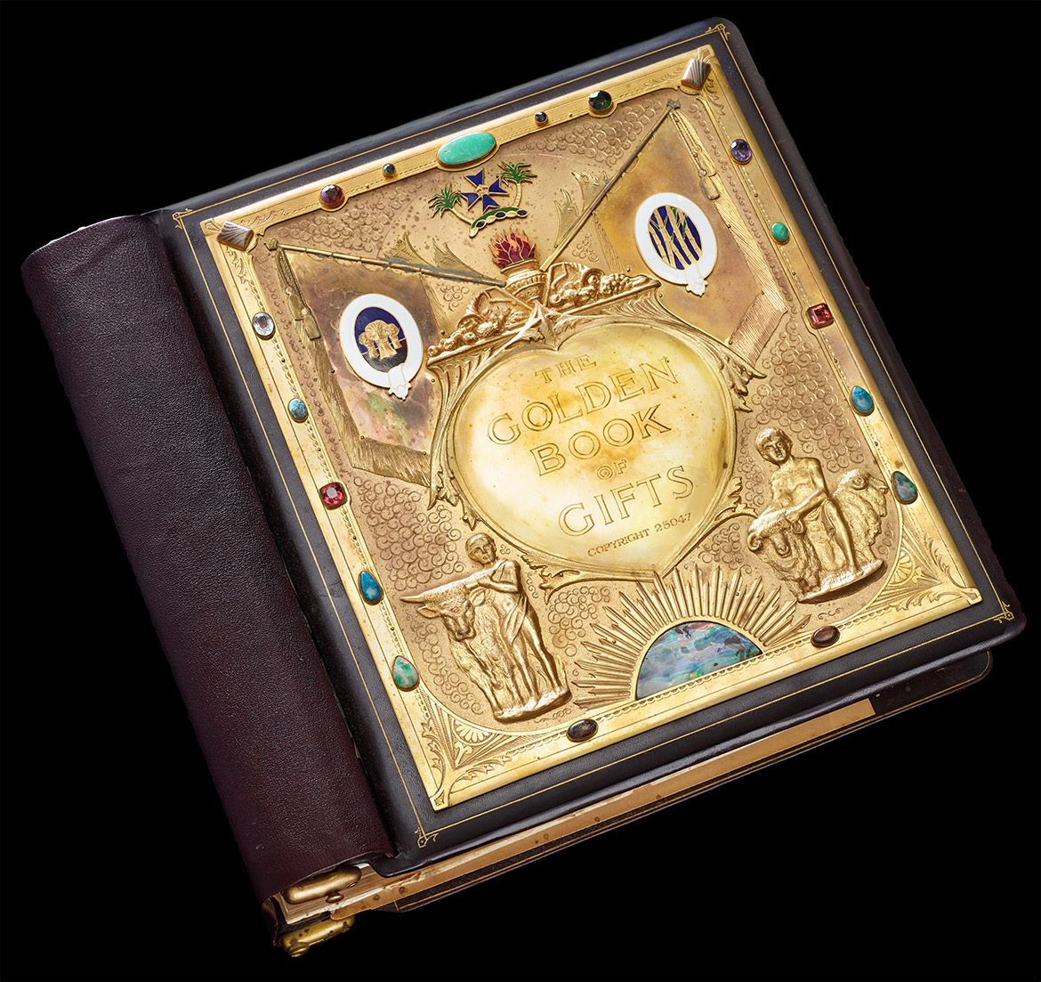 The Golden Book of Gifts c. 1934 / W. Harvey (Australia), goldsmith / Queensland Art Gallery, Commissioner / Brass, bronze, semiprecious stones, enamel / 40 x 40 x 13cm / The Mitchell Wolfson, Jr. Collection, 85.2.122 / The Wolfsonian–Florida International University, Miami Beach Florida / Photograph: Lynton Gardiner