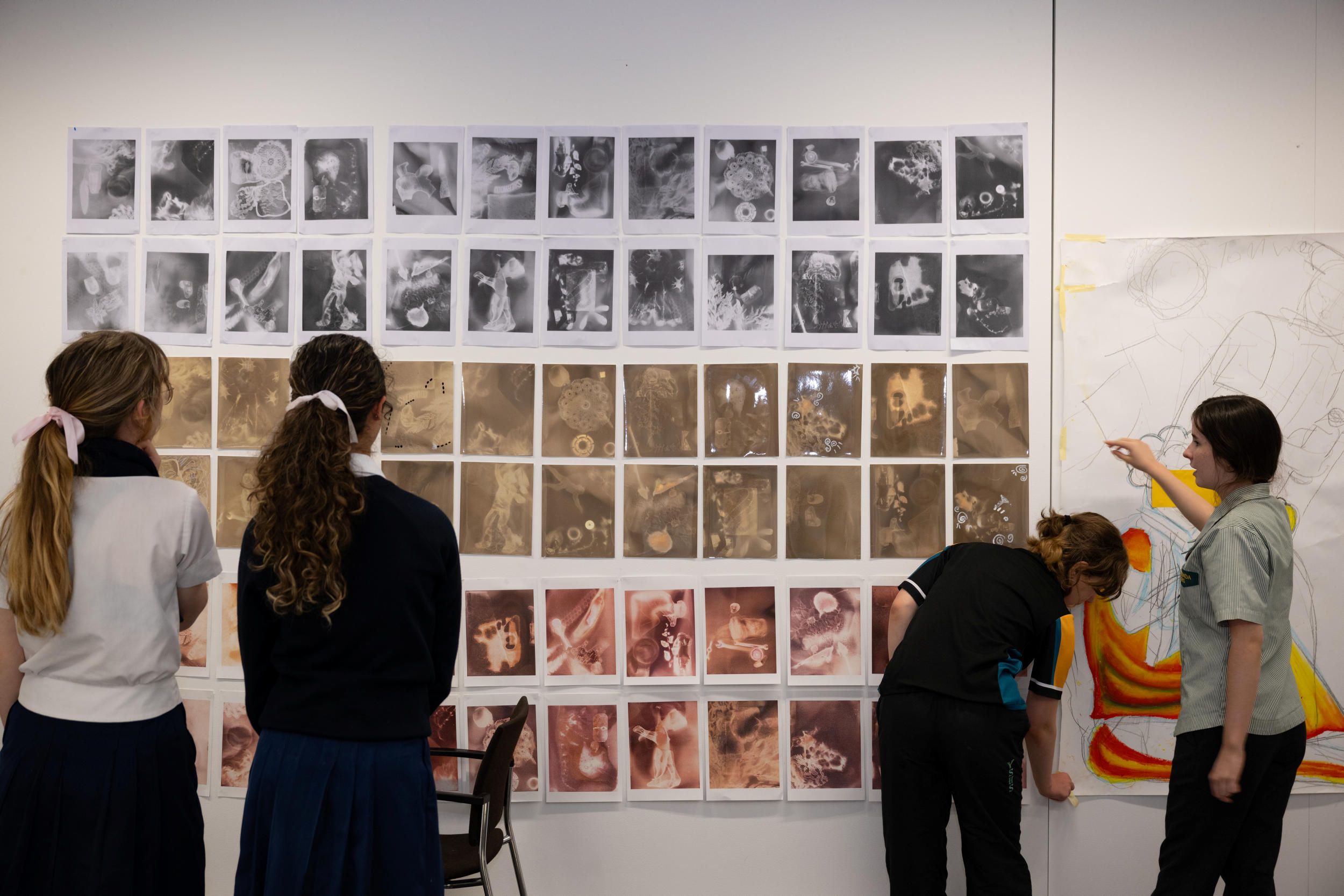 Students installing artwork during final session of Art Academy / Photograph: N Umek © QAGOMA