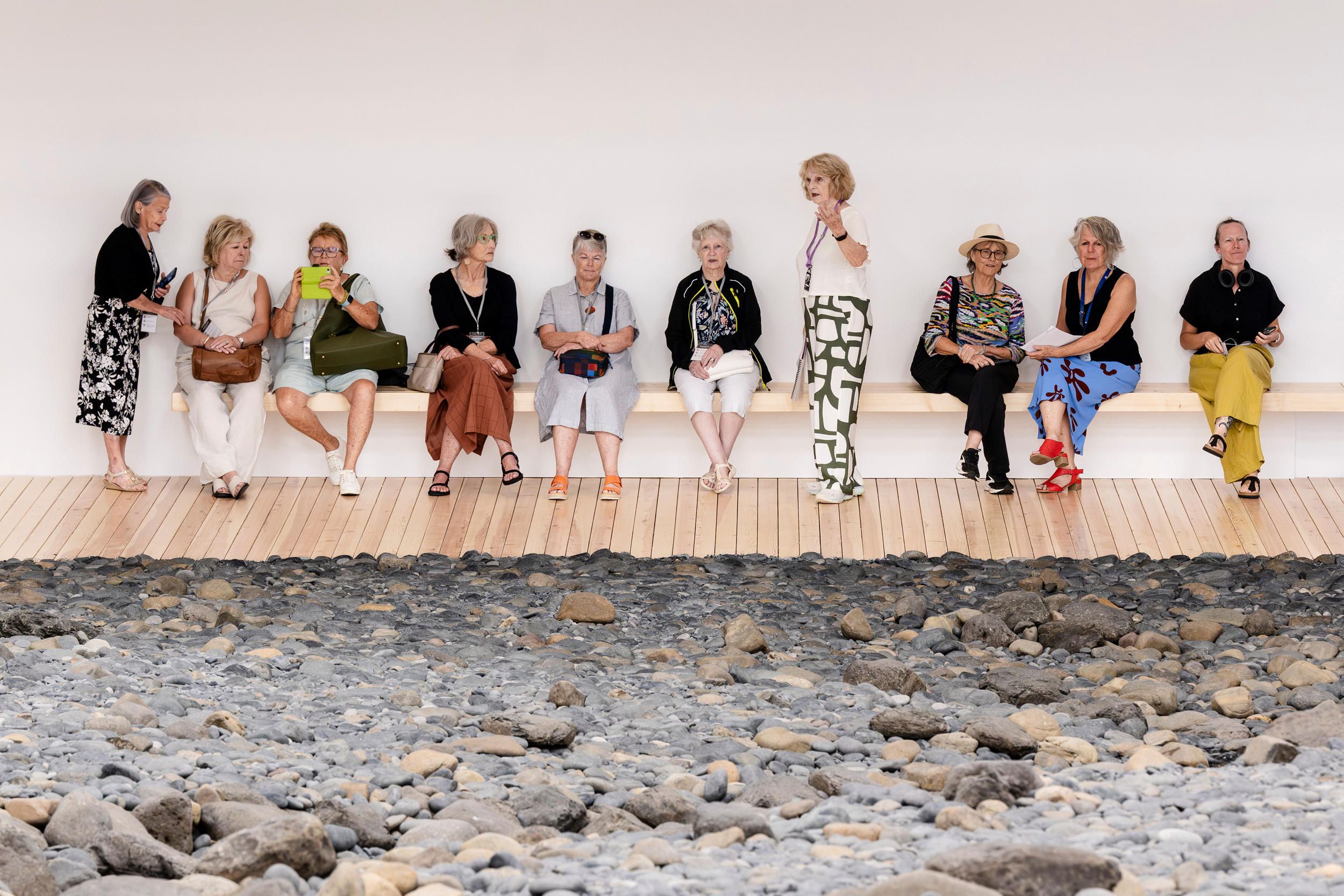 A Volunteer Guide leads visitors on a tour at GOMA. / Photography: Joe Ruckli / © QAGOMA 