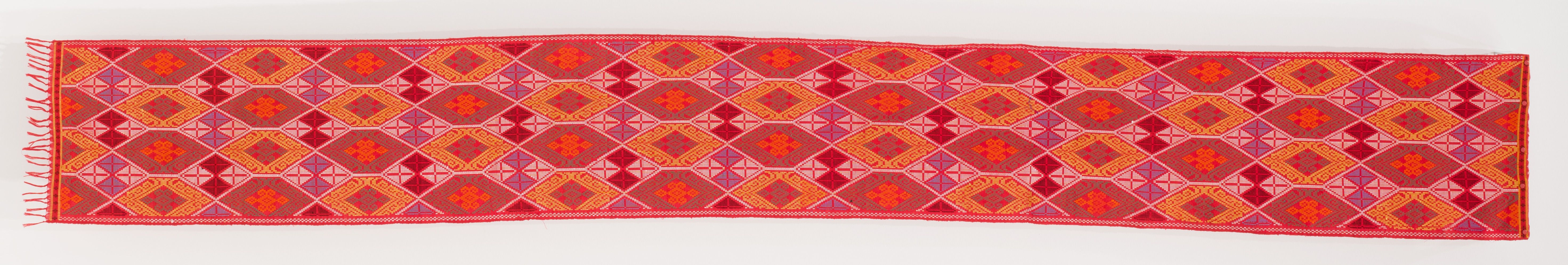 Bilma Ausalin Hatamun / Yakan people / The Philippines b.1973 / Lives and works in Parangbasak, Basilan Province, The Philippines / Bunga sama [red] 2024 / Woven cotton / Purchased 2024 with funds from the Bequest of Noela Clare Deutscher, in memory of her parents, A. Evans Deutscher and Clare Deutscher, through the Queensland Art Gallery | Gallery of Modern Art Foundation / © Bilma Ausalin Hatamun / Photograph: C Callistemon, QAGOMA