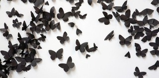 Carlos Amorales / Mexico b.1970 / Black Cloud (detail) 2007/2018 / 30 000 black laser-cut and handfolded paper butterflies (30 different butterfly and moth species in five sizes with a wave wing pattern), ed. 1/3 (+ 1 A.P.) / dimensions variable / Purchased 2022 with funds from Tim Fairfax AC through the Queensland Art Gallery | Gallery of Modern Art Foundation / Images courtesy: kurimanzutto, Mexico City
