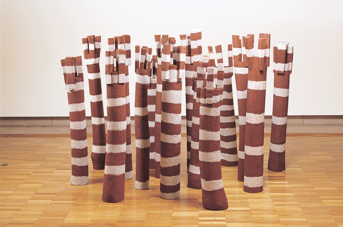Joe Ngallametta, Kugu-Muminh/Kugu-Uwanh people, Australia 1945-2005 / Thap yongk (Law poles) 2002-03 / Carved milkwood (Alstonia muellerana) with synthetic polymer paint and natural pigments / 15 components: 182 x 250 x 250cm (installed, approx.) / Acc. 2003.159a-o / Commissioned 2002 with funds from the Queensland Art Gallery Foundation Grant / Collection: Queensland Art Gallery | Gallery of Modern Art / © Estate of Joe Ngallametta, courtesy of the Wik & Kugu Arts Centre, Aurukun