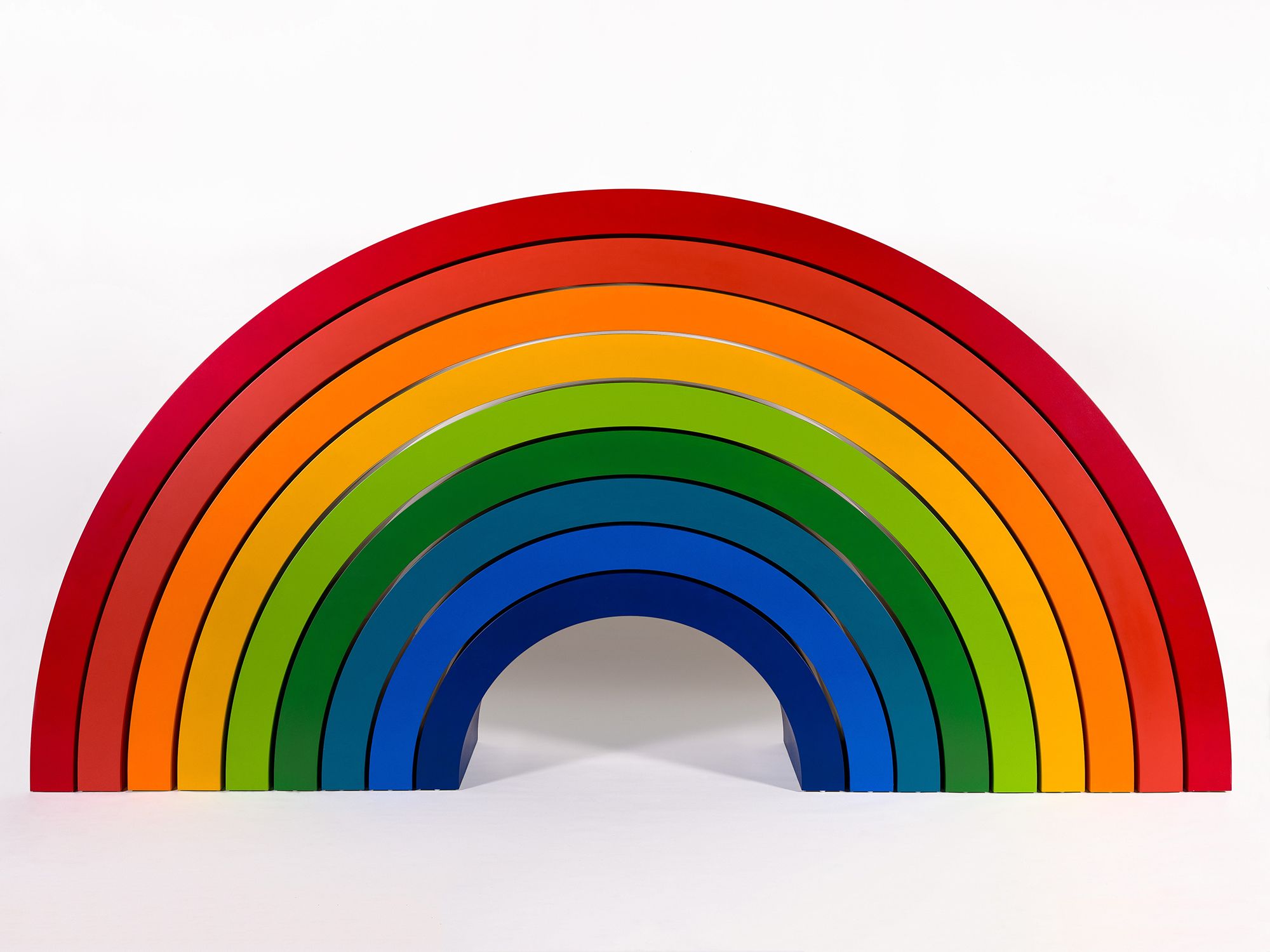 Emily Floyd, Australia b.1972 / Steiner rainbow 2006 / Two-part epoxy paint on medium density fibreboard / Nine parts. Part a (dark blue): 54 x 131 x 60cm; part b (light blue): 82 x 160 x 60cm; part c (teal): 96 x 188 x 60cm; part d (dark green): 110 x 217 x 60cm; part e (light green): 124.5 x 245 x 60cm; part f (yellow): 139 x 275 x 60cm; part g (orange): 154 x 303 x 60cm; part h (light red): 166 x 334 x 60cm; part i (deep red): 180 x 362.5 x 60cm. / Gift of the artist through the QAG Foundation 2011. Donated through the Australian Government's Cultural Gifts Program / Collection: Queensland Art Gallery | Gallery of Modern Art / © Emily Floyd