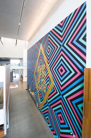 Reko Rennie, Kamilaroi/Gamilaraay/Gummaroi peoples, Australia b.1974 / Trust the 2% 2013 / Synthetic polymer paint on wall; synthetic polymer paint on MDF / Site-specific commission for ‘My Country, I Still Call Australia Home: Contemporary Art from Black Australia’ / Courtesy and ©: The artist