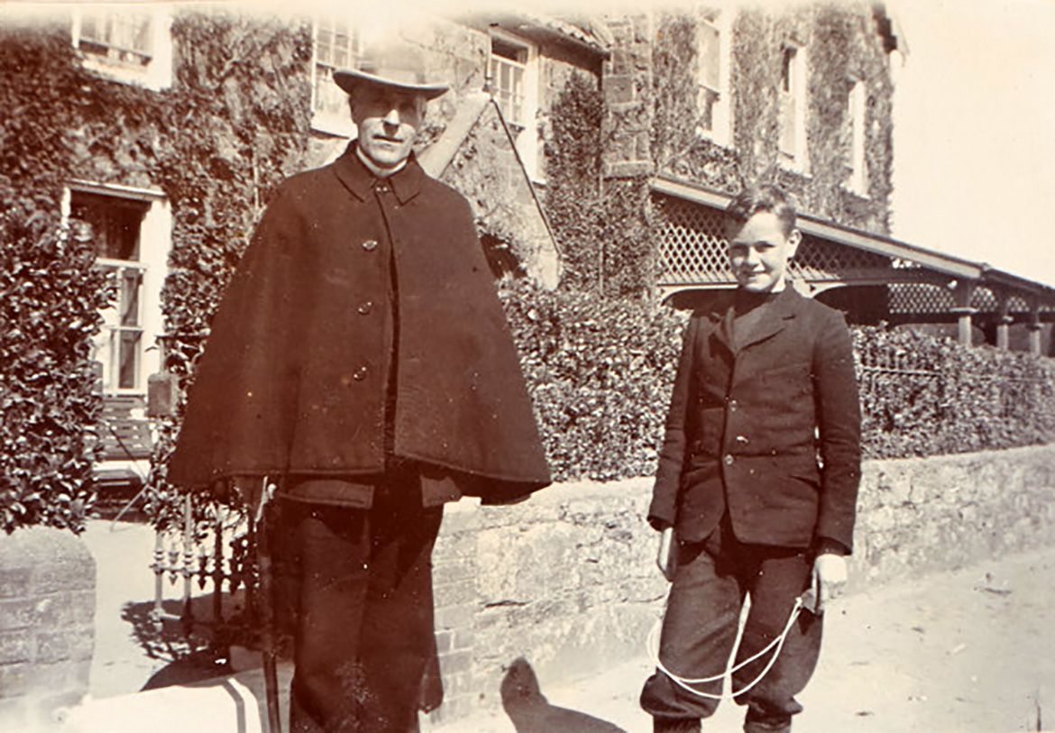 Page from the album of Ethel Fairweather showing photograph of Ian Fairweather (right) with friends and family members / Collection: QAGOMA Research Library / © QAGOMA