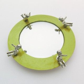 Barbara Heath, Australia b.1954 / Brooch, 'babies' 1989 / Anodised aluminium, cast sterling silver and convex mirror / 4 x 12.5cm (diam.) / Purchased 1994 under the Contemporary Art Acquisition Program through the QAG Foundation / Collection: Queensland Art Gallery | Gallery of Modern Art / © QAGOMA