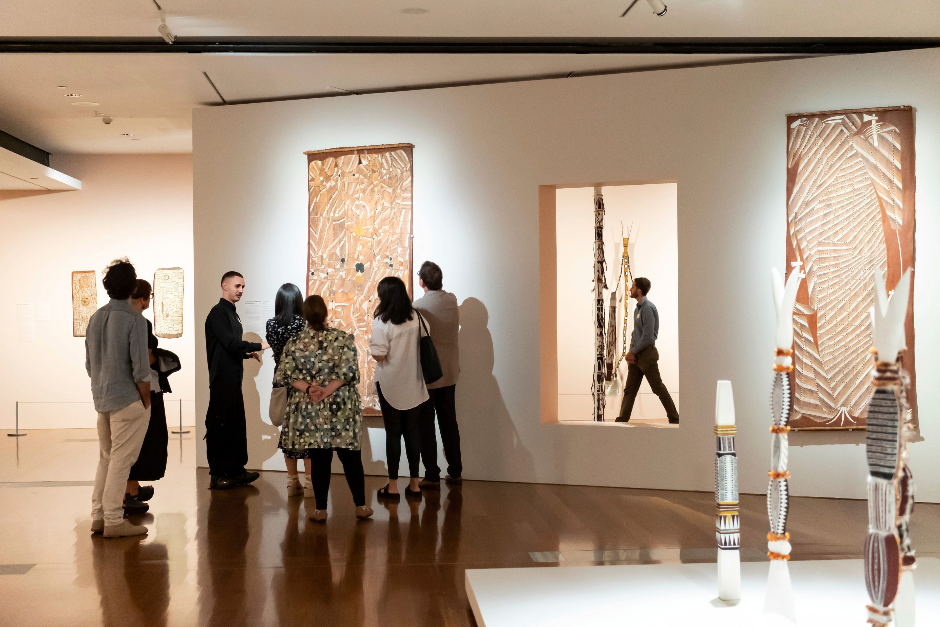 During a curatorial tour at a Business Leaders Network event, with Kunwinjku artist John Mawurndjul’s Mardayin and wongkurr (Sacred objects and dilly bags) 1994 (Purchased 1994. QAG Foundation / Collection: QAGOMA / © John Mawurndjul/Copyright Agency, 2023), GOMA, February 2023 / Photograph: Natasha Harth