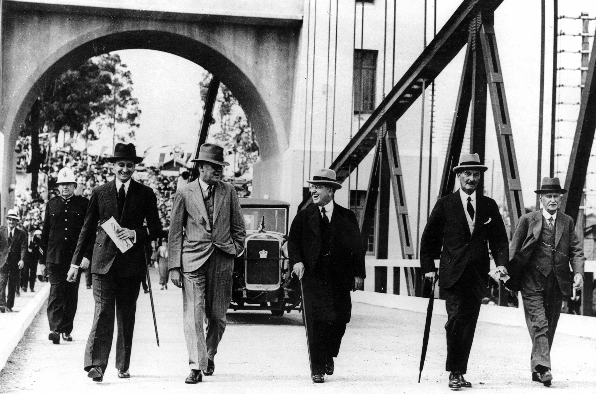 Official opening of the Indooroopilly Toll bridge (renamed Walter Taylor in 1956) with Governor of Queensland, Sir Leslie Orme Wilson, and the official party with Walter Taylor (far right), 1936 / 99183512923302061 / Courtesy: John Oxley Library, State Library of Queensland, Brisbane
