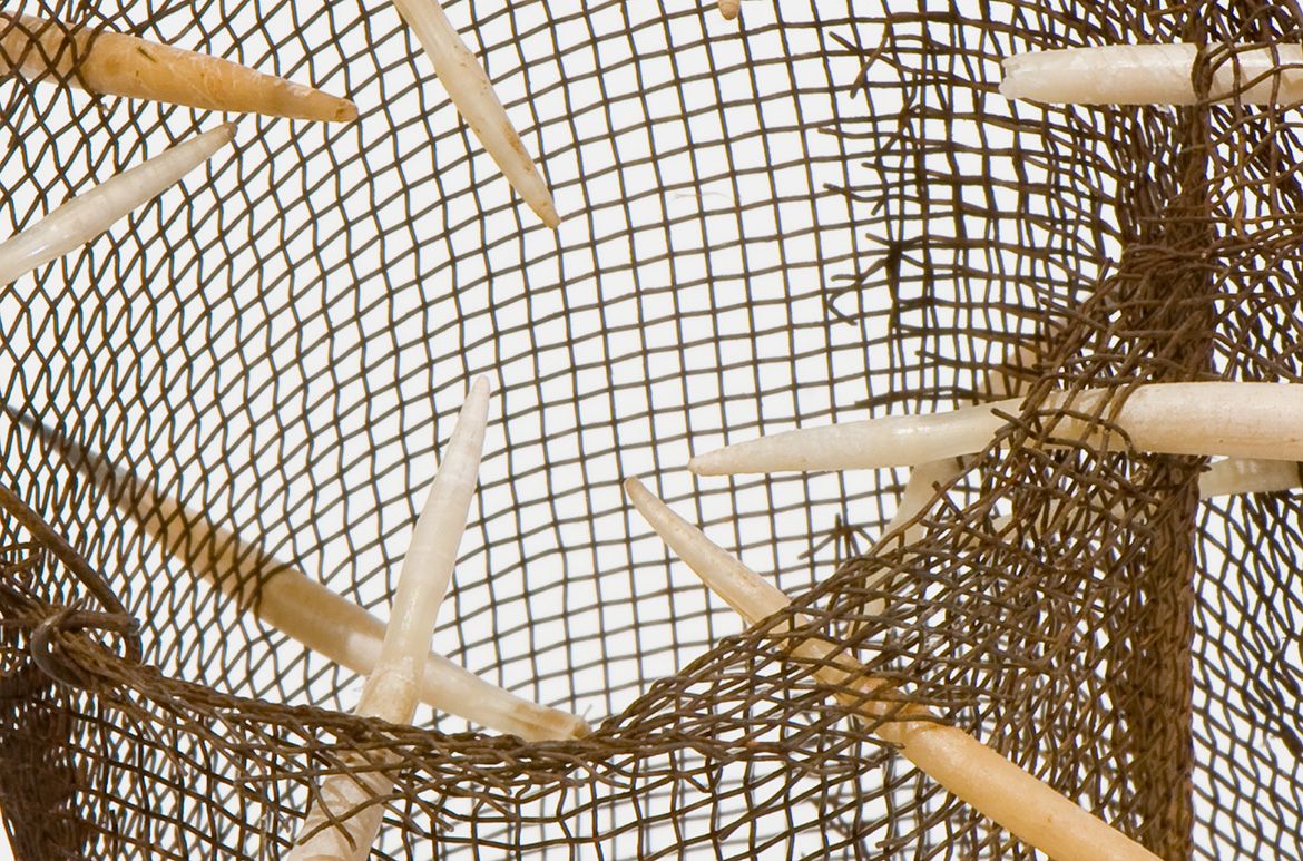 Lorraine Connelly-Northey, Waradgerie people, Australia b.1962 / Narrbong (String bag) 2007, Rusted gauze wire with white pelican down, 24.5 x 10 x 10cm / Narrbong (String bag) 2007, Rusted gauze wire with black pelican down, 24 x 9 x 9cm / Narrbong (String bag) 2007, Rusted gauze wire with galah feathers and pelican down, 15 x 8 x 8cm / Narrbong (String bag) 2007, Rusted gauze wire with echidna quills, 33.5 x 8 x 9cm / Purchased 2008. The Queensland Government’s Gallery of Modern Art Acquisitions Fund / Collection: Queensland Art Gallery | Gallery of Modern Art, Brisbane / © Lorraine Connelly-Northey