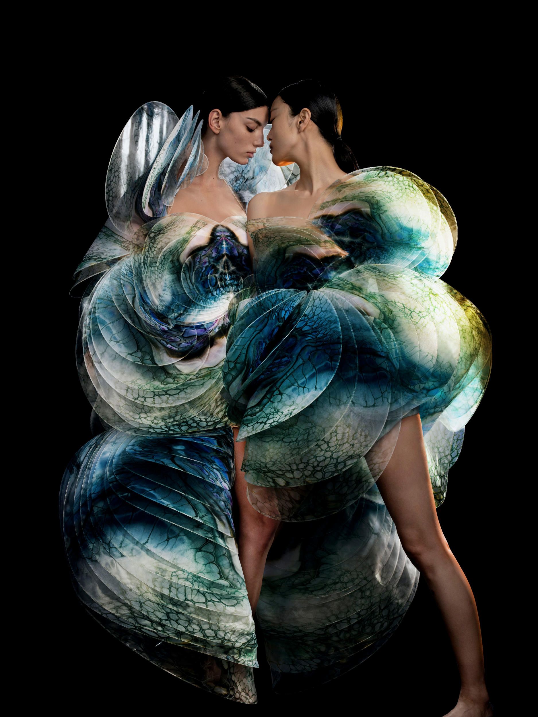 Iris van Herpen / Netherlands b.1984 / Sensory Seas dress and Nautiloid dress, from the ‘Sensory Seas’ collection 2020 / Glass organza, Pet G, cotton / Print collaborator: Shelee Carruthers / Collection: Iris van Herpen / Photograph: David Uzochukwu / © David Uzochukwu