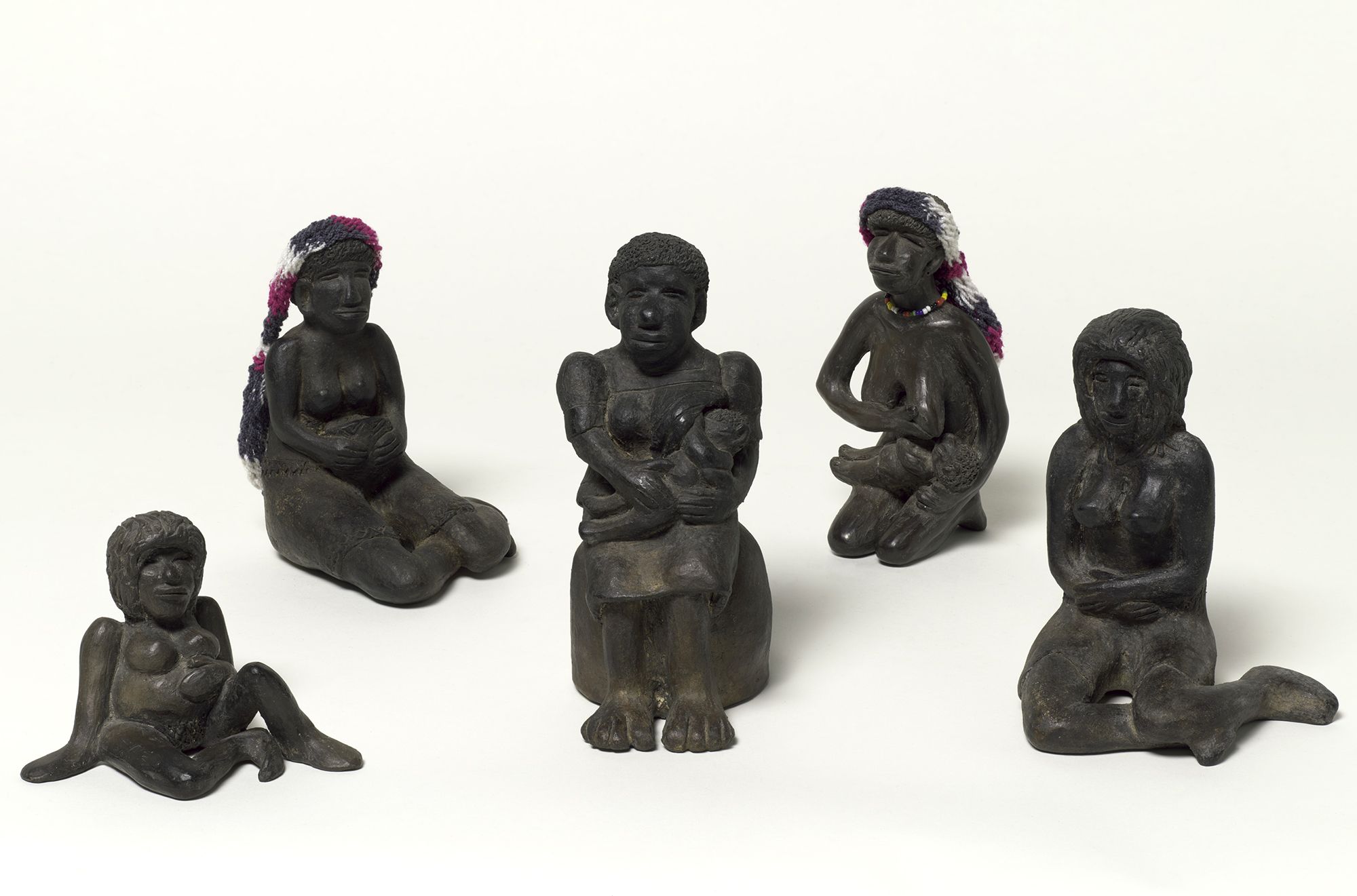 A selection of Gole’s ‘Susu mama’ figurines on display in ‘The 10th Asia Pacific Triennial of Contemporary Art’, QAGOMA, Brisbane, December 2021 / © Joyce Mary Aresepa Gole, OL