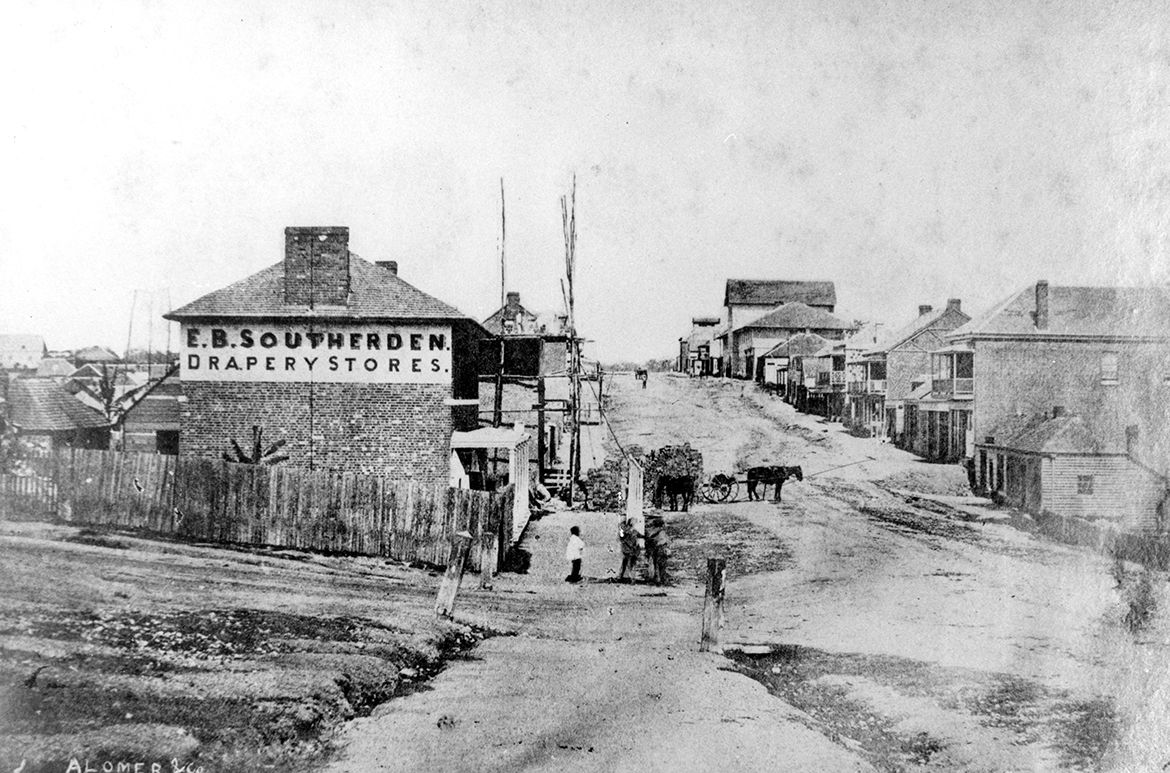 A. Lomer & Co / Queen Street (cnr Edward Street), Brisbane c.1859 / 99183506612902061 / Courtesy: John Oxley Library, State Library of Queensland, Brisbane