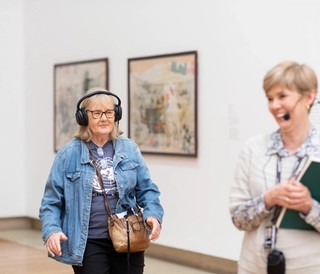 Volunteer guided tour for visitors with hearing loss at the Queensland Art Gallery. Photograph: C. Callistemon