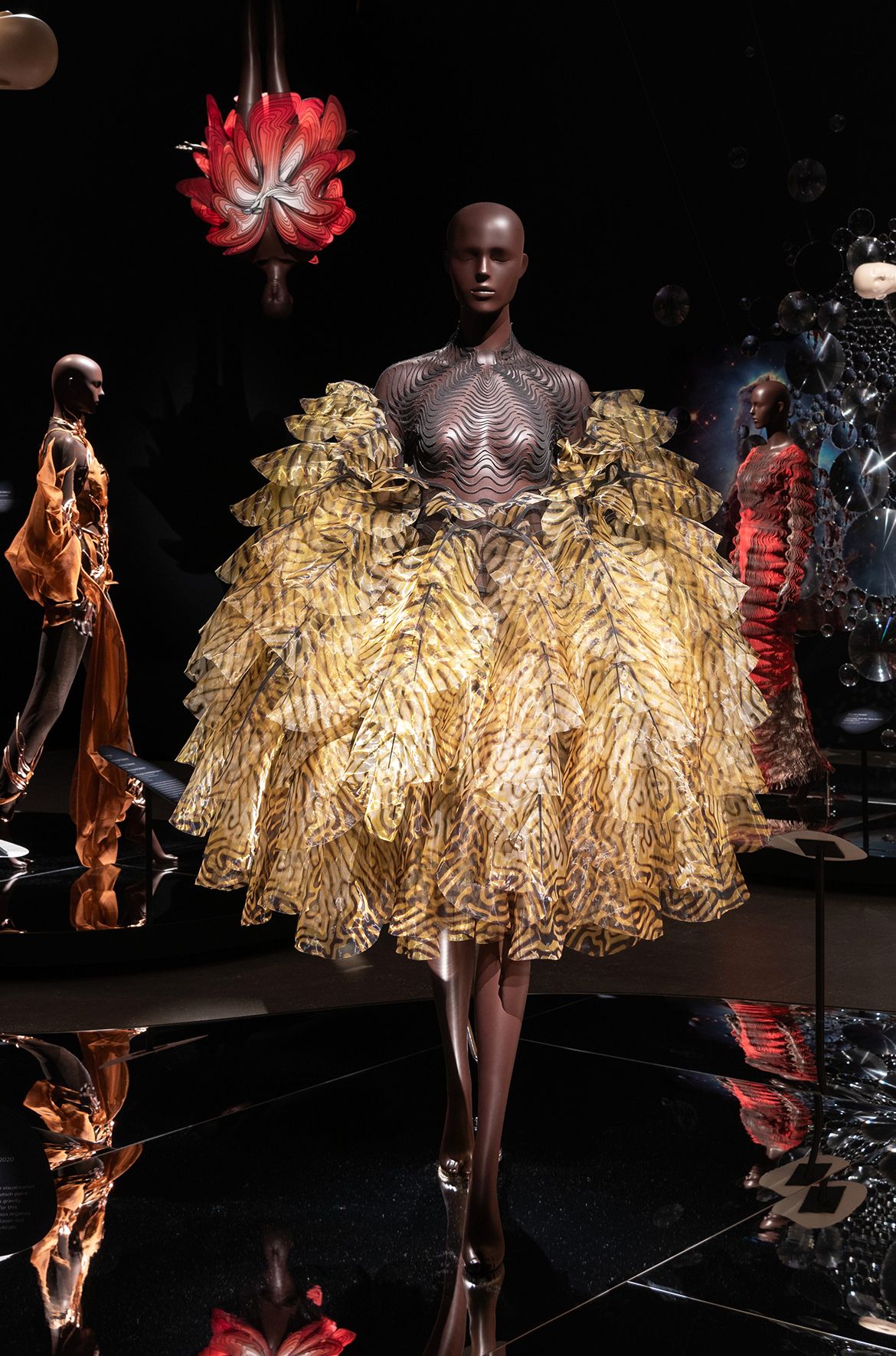 Iris van Herpen, Netherlands b.1984 / Perry Hall (Collaborator), United States b.1967 / Fractal Flows dress, from the ‘Sensory Seas’ collection 2020 installed in ‘Iris van Herpen: Sculpting the Senses’, GOMA 2024 / Glass organza, laser-cut Komon Koubou, tulle / Worn by supermodel Kate Moss in Vogue Hong Kong, March 2021 / © Iris van Herpen atelier / Photograph: N Umek © QAGOMA