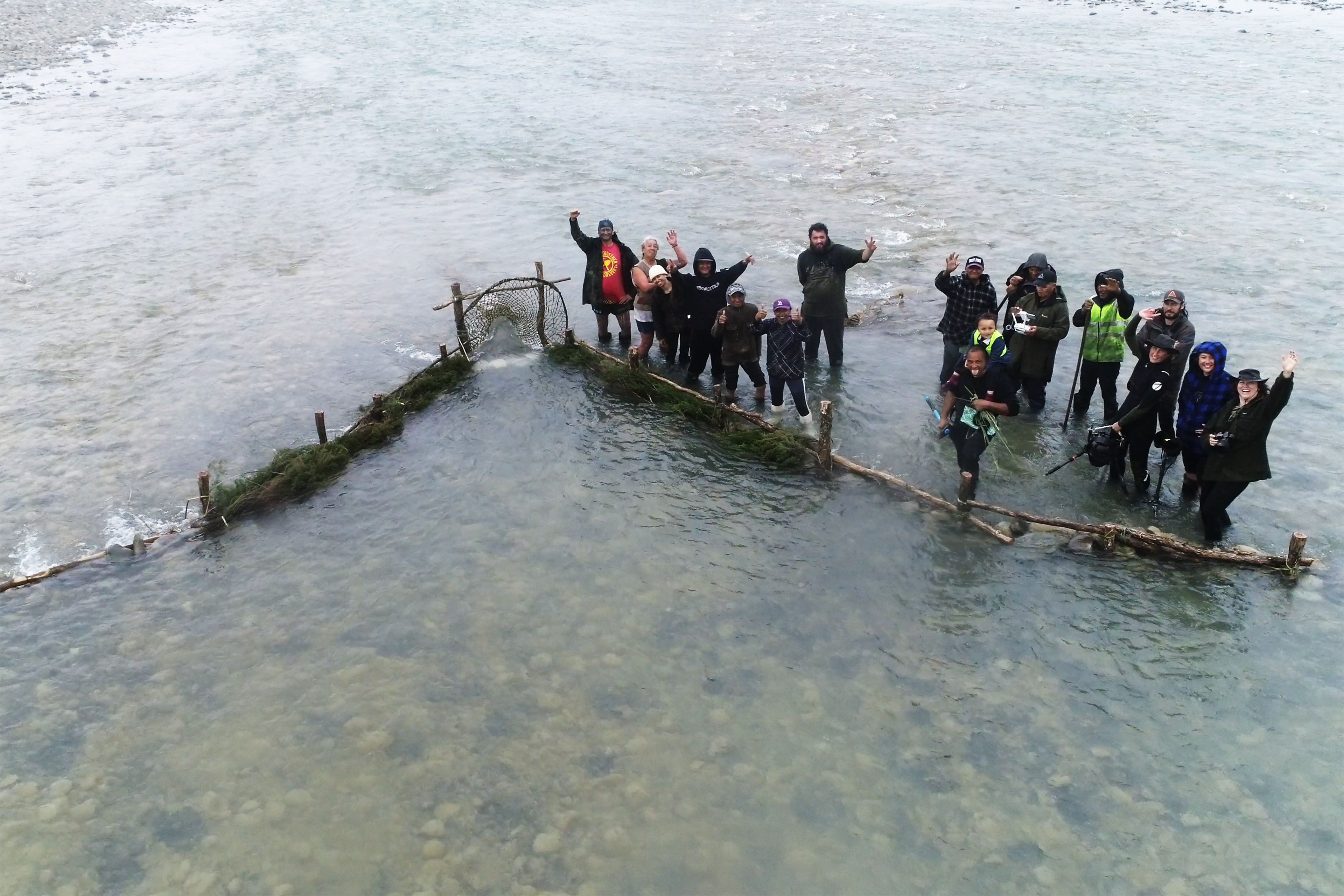AWA members (l–r): Abraham Karaka, Selina Mathieson, Te Ataakura Tanirau Wickliffe, Graeme Atkins, Arihia Kaiwai, Tamarangi Papuni Iles, Lisa Beach, Jury Haenga, Jellicoe Atkins, Paora Brooking, Joseph Kaiwai, Rakairoa Tuhaka Te Kahu Gray with Te Aomarama Kairaupatu on shoulders, Ivan Henry, Alex Monteith, Maree Sheehan and Natalie Robertson, September 2023 / Photograph: Paora Brooking