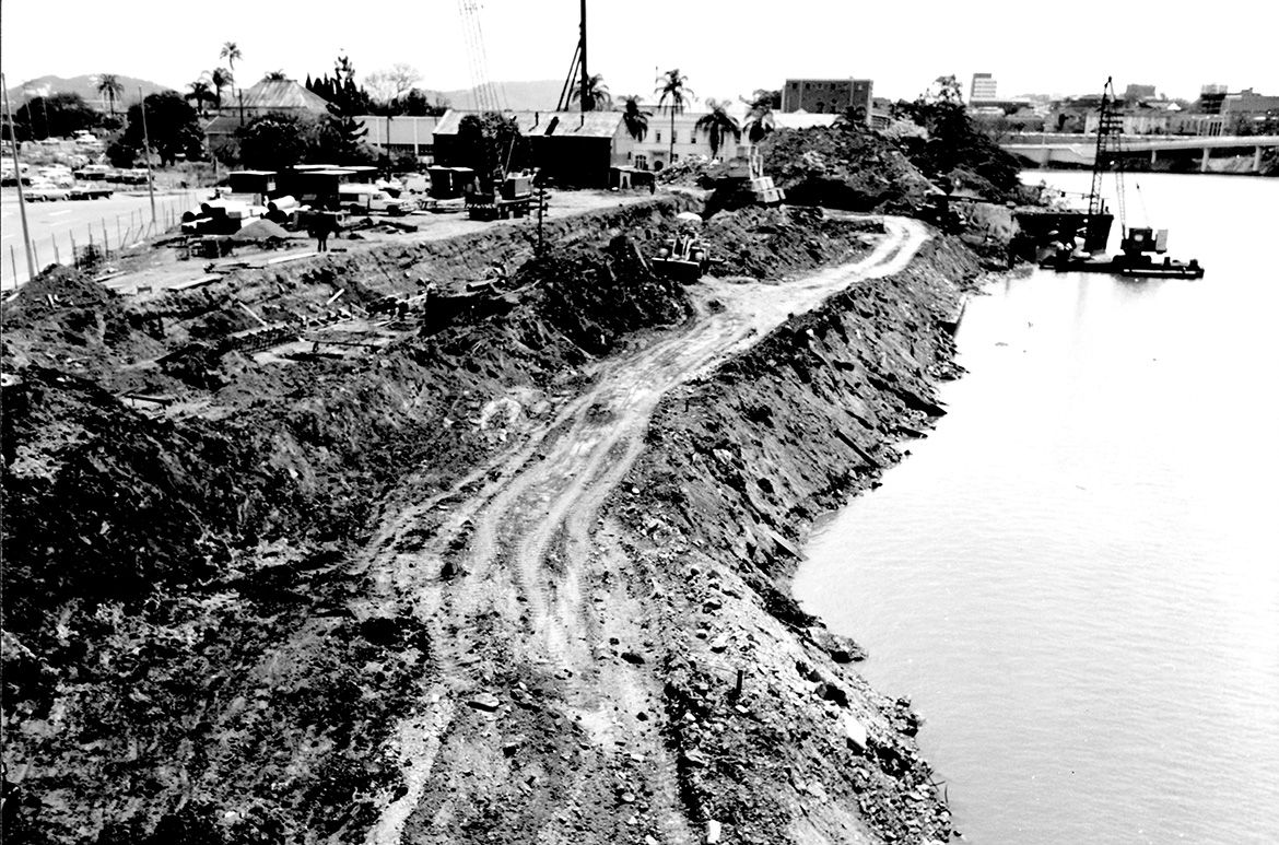 Queensland Art Gallery construction with earthworks underway along the Brisbane River / Collection: QAGOMA Research Library