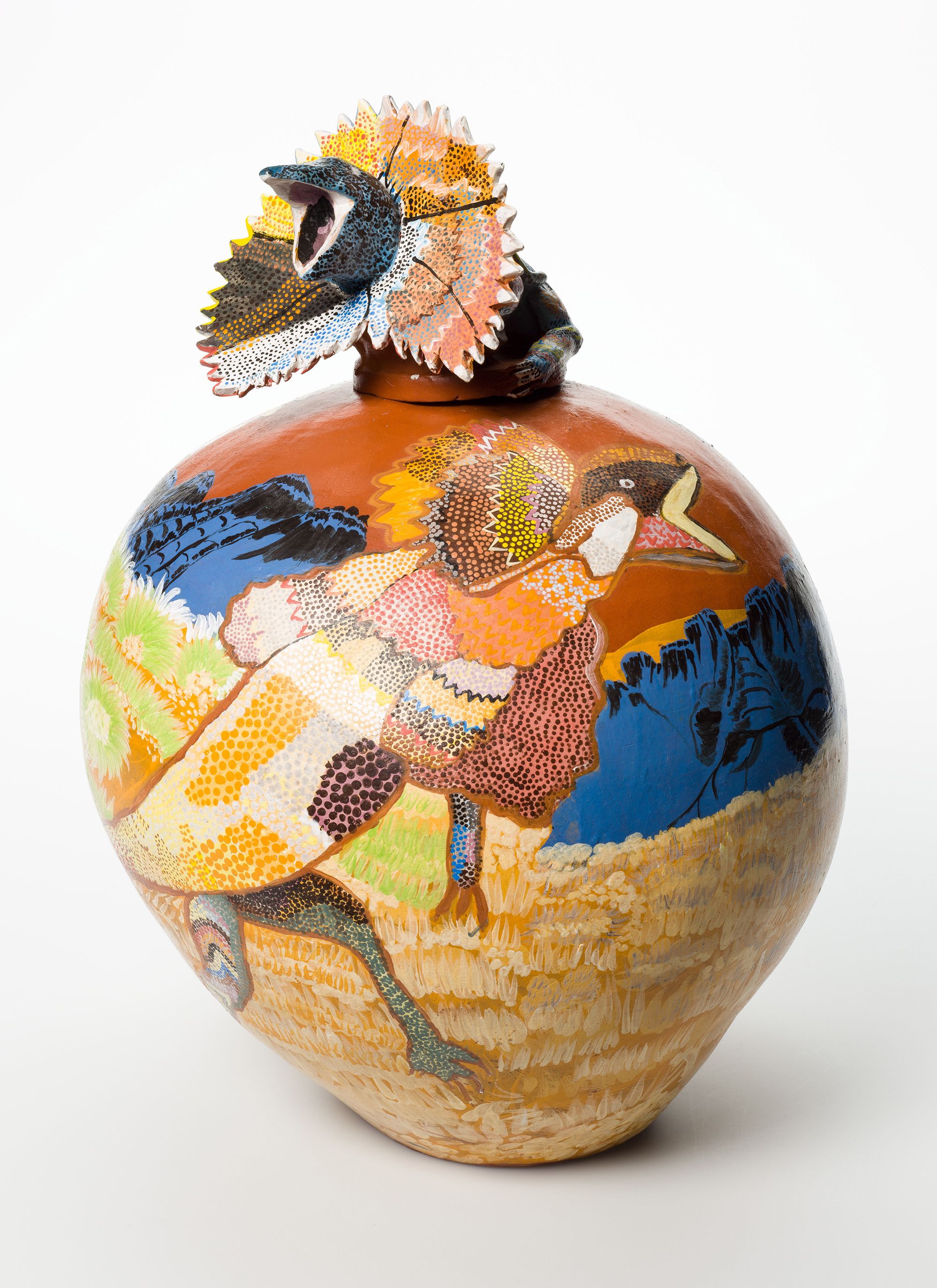 Hermannsburg Potters, Northern Territory, Australia est. 1990 / Rahel Ungwanaka, Arrernte/Luritja people, Australia b.1946 / Ankarta (Frill-necked lizard) 2005 / Earthenware, hand-built terracotta clay with underglaze colours and applied decoration / 39 x 26cm (diam.) (complete);pot: 28 x 26cm (diam.);lid: 12 x 17.5 x 13cm / Purchased 2006. QAG Foundation / Collection: Queensland Art Gallery | Gallery of Modern Art / © Rahel Ungwanaka