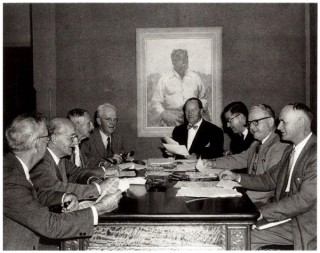 Trustees meeting, 14 May 1957, at which Portrait of Albert Namatjira by William Dargie was purchased by the Trustees for the Queensland National Art Gallery (QAGOMA). Photograph courtesy Courier-Mail, Brisbane