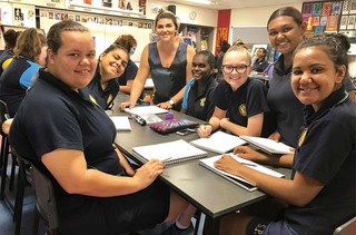 Art teacher Ebony Russell with several students studying year 12 Visual Arts in Practise at St Patrick’s College Townsville / Kimberley Rocky, Jessie Blitner, Vronique Pootchemunka, Tayla-Jeanne Finemore, Jardena Hookey and Yalul Felton-Busch.