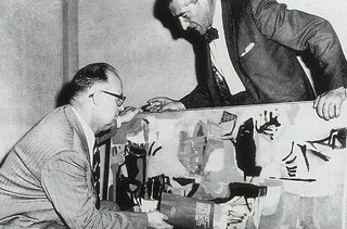 Russell Drysdale and Laurie Thomas (Director, Queensland Art Gallery 1961-67) assessing entries in the 1961 HC Richards Prize, Queensland Art Gallery / Image courtesy: Courier Mail, Brisbane