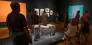 Facilitator Logan Bobongie with audience at 'Art & This Place' tour at the Queensland Art Gallery / March 2023 / Photograph: C Baxter, QAGOMA