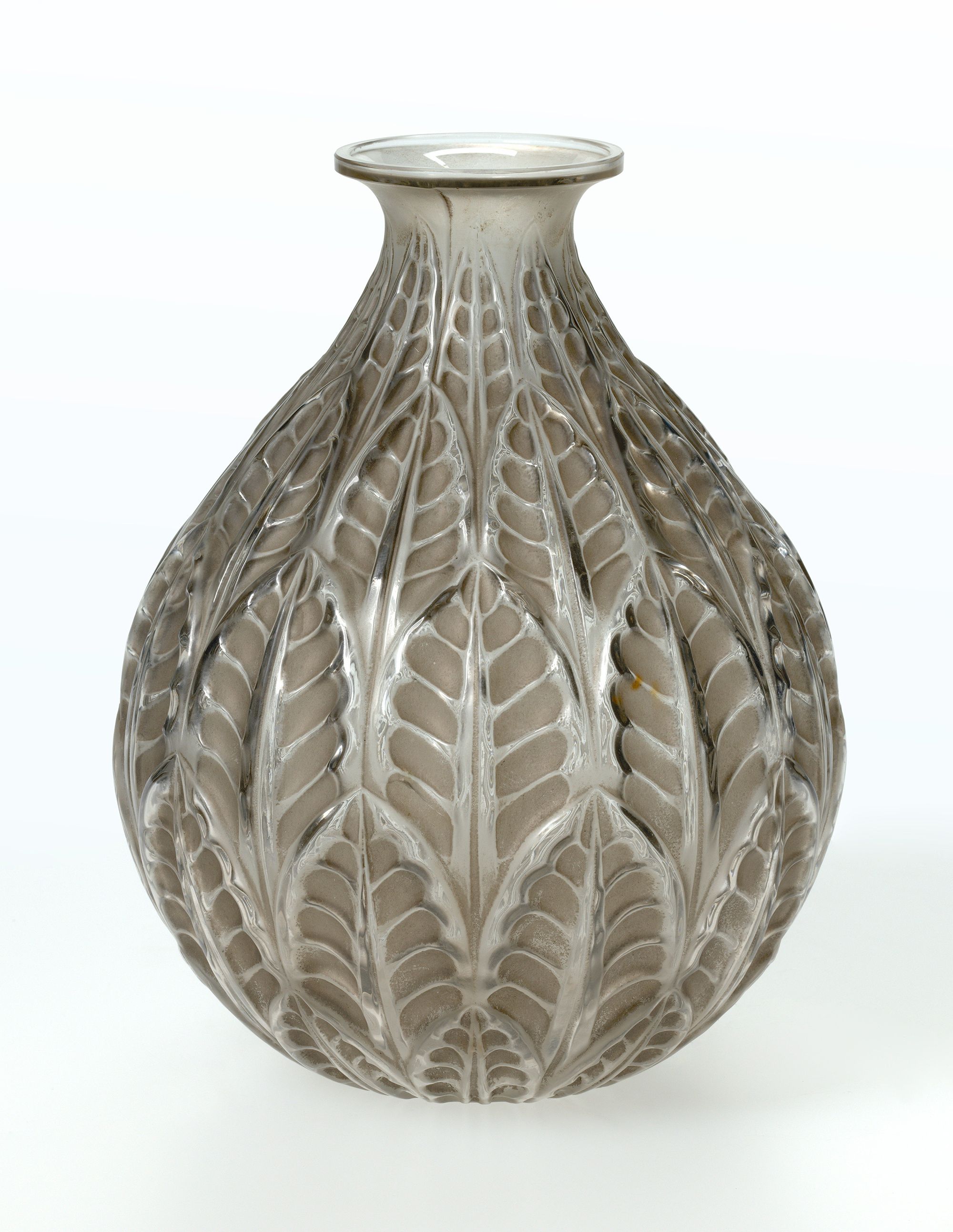 CRISTALLERIE LALIQUE ET CIE, France est. 1902 / René Lalique, France 1860–1945 / Vase: Malsherbe c.1923 / Mould blown grey glass with a design of acanthus leaves. Stained grey / 22 x 17.5cm (diam.) / Purchased 1989 / Collection: Queensland Art Gallery | Gallery of Modern Art