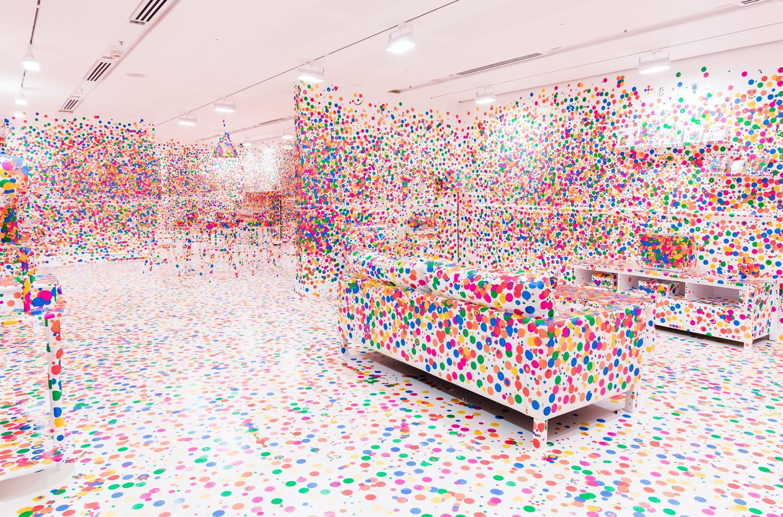 Yayoi Kusama, Japan b.1929 / The obliteration room 2002-present / Furniture, white paint, dot stickers / Collaboration between Yayoi Kusama and Queensland Art Gallery. Commissioned Queensland Art Gallery. Gift of the artist through the QAG Foundation 2012 / Collection: Queensland Art Gallery | Gallery of Modern Art / © Yayoi Kusama / Photograph N Harth © QAGOMA