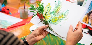 Art and Dementia program participants engage in creative making activity / Photograph: C Callistemon / © QAGOMA