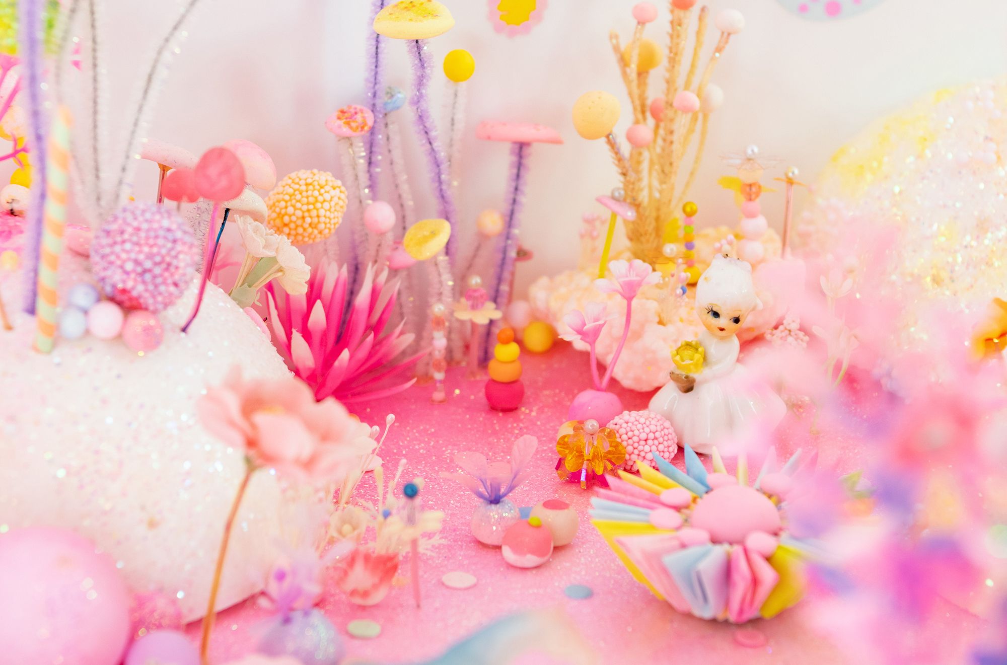 Pip & Pop, Australia 2007–2011 / Tanya Schultz, Australia b.1972 / Nicole Andrijevic, Australia b.1981 / 'Rainbow bridge' from 'we miss you magic land!' 2011 / Dioramas: Polystyrene, wax, fluorescent pigments, sugar, glue, glitter, synthetic polymer paint, plastic plants, plastic flowers, pipe-cleaners, modelling clay, paper, adhesive vinyl, pigment ink, beads in vitrine with internal electric lighting with perspex inserts; installed with wallpaper: digital adhesive on paper (produced from digital file) / Commissioned for ‘Pip & Pop: we miss you magic land’ 2011, a collaboration with QAGOMA’s Children’s Art Centre / Gift of the artists through the QAG Foundation 2013 / Collection: Queensland Art Gallery | Gallery of Modern Art / © Pip & Pop