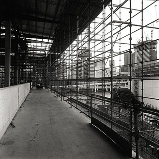 GOMA construction Photograph by Peter Liddy Camera scan of black and white medium format negative