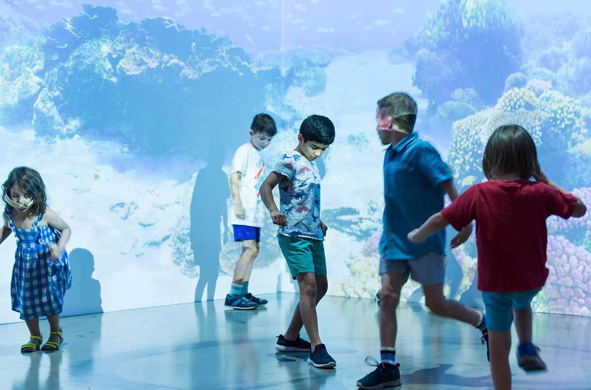 Tungaru: The Kiribati Project, Est. 2012 / Jeff Smith, Aotearoa New Zealand b.1962 / Mauri 2018 / Site-specific built environment for APT9 Kids: projectors, cameras, ambient soundtrack, MDF, plywood, timber, movement sensor, PC / Commissioned for APT9 Kids with support from the Tim Fairfax Family Foundation / The artist would like to thank Chris Charteris, Mike Faulkner, Jude Folkard, Sam Folkard, Andy Johnson, Lizzy Leckie and Kaetaeta Watson / © Jeff Smith