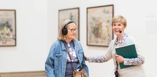 A volunteer guided tour for visitors with hearing loss at the Queensland Art Gallery. Photography: C. Callistemon © QAGOMA