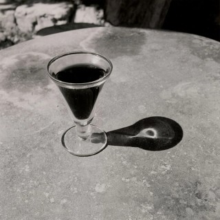 Bill Culbert, New Zealand/England/France 1935-2019 / Small glass pouring light 1997, printed 2002 / Gelatin silver photograph on paper / 41.2 x 41.2cm (comp.) / Purchased 2002. Queensland Art Gallery Foundation Grant / Collection: Queensland Art Gallery | Gallery of Modern Art / © Bill Culbert