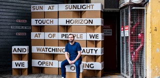 Sebastian Moody with his collaborative work with Cox Architecture, Sunlounge 2018 / Photograph: Alanna McTiernan / Image courtesy: Brisbane City Council and Onespace Gallery