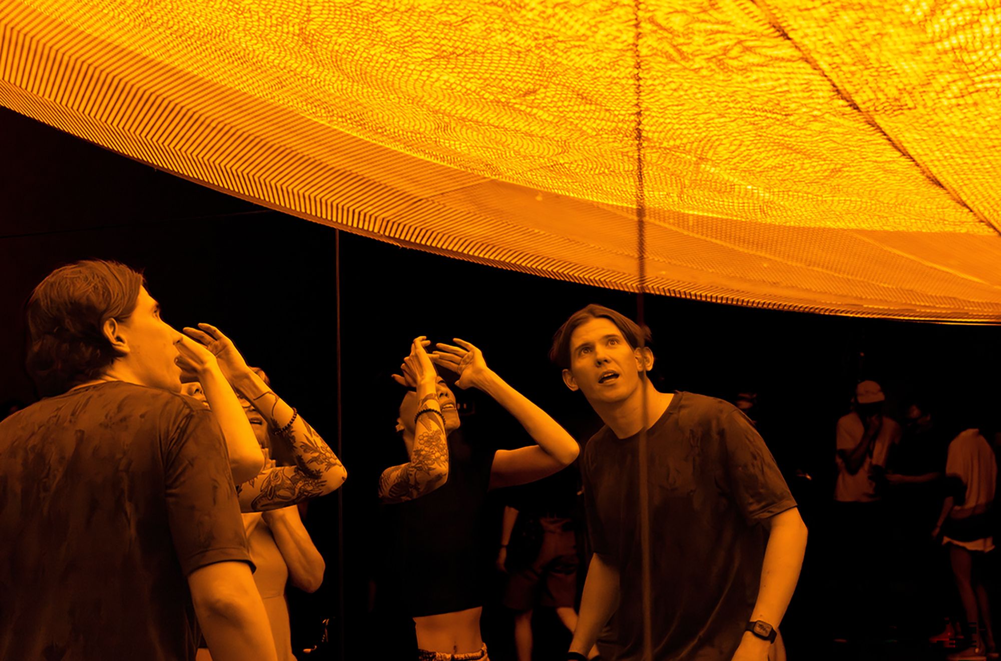 Olafur Eliasson, Denmark b.1967 / Presence 2025 / Stainless steel, aluminium, monofrequency lights, printed textile wedges, aluminium perforated sheets, mirror foil, glass mirror, wood / © 2025 Olafur Eliasson / Courtesy: The artist; neugerriemschneider, Berlin; and Tanya Bonakdar Gallery, New York / Photograph: C Baxter © QAGOMA