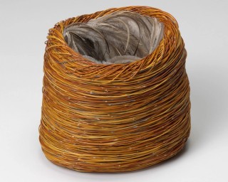 Shirley Macnamara, Indjalandji/Alyawarr, Australia b.1949 / Guutu (vessel) 14 2001 / Woven spinifex (Triodia pungens), emu feathers, nylon thread and synthetic polymer fixative / 24.3 x 22.5 x 21cm / Purchased 2002. Queensland Art Gallery Foundation Grant / Collection: Queensland Art Gallery | Gallery of Modern Art, Brisbane / © Shirley Macnamara