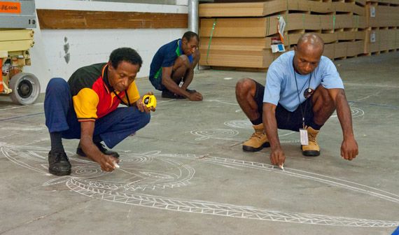 Artists from Papua New Guinea prepare a layout for the construction of a representation of an Abelam House, to be constructed as part of the 7th Asia Pacific Triennial at the Queensland Art Gallery, Brisbane in 2012