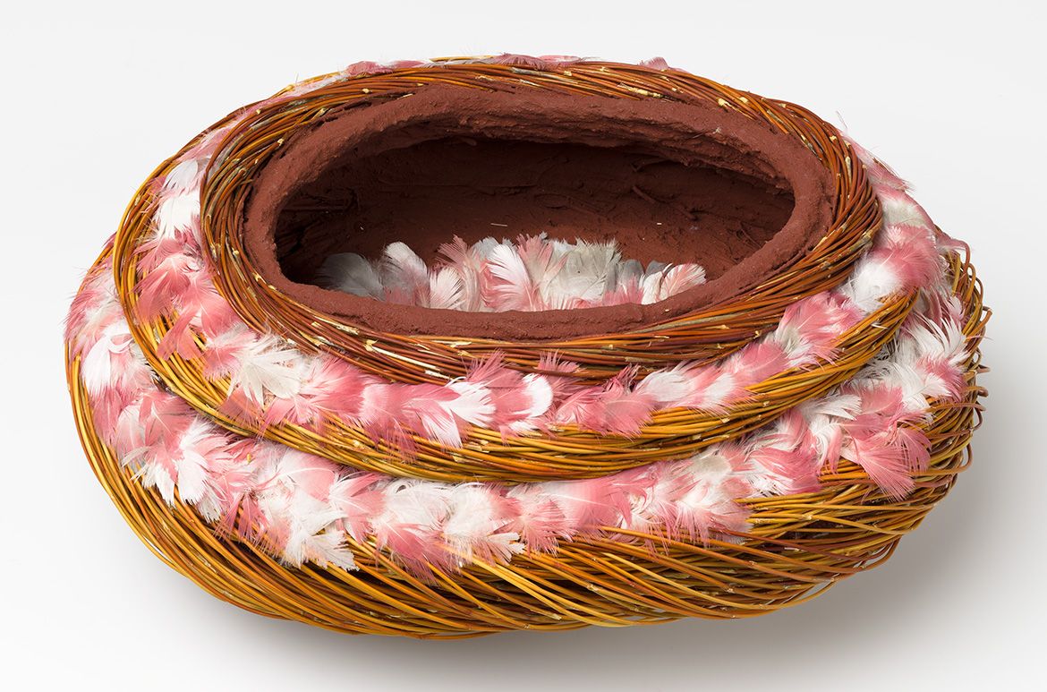 Shirley Macnamara, Indjalandji/Alyawarr, Australia b.1949 / Erkel (vessel) 2010 / Twined spinifex (Triodia pungens), red ochre, galah feathers, nylon thread and synthetic polymer fixative / 14 x 31 x 25cm / Purchased 2010 with funds from the
Bequest of Grace Davies and Nell Davies through the Queensland Art Gallery
Foundation / Collection: Queensland Art Gallery | Gallery of Modern Art, Brisbane / © Shirley Macnamara