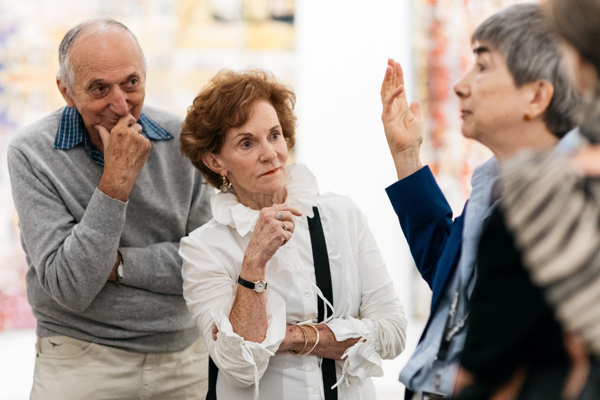 A Volunteer Guide engages visitors on a tour at the Gallery of Modern Art. Photography by Joe Ruckli | QAGOMA