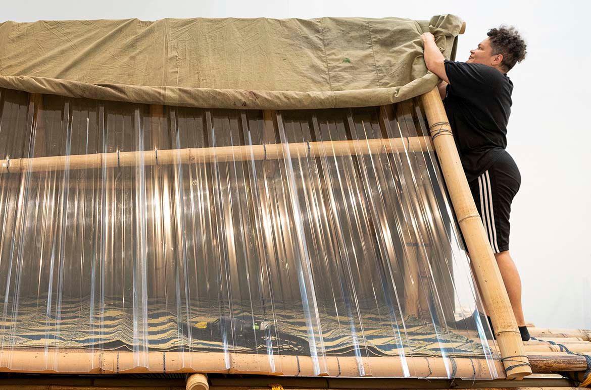 Salote Tawale, Fiji/Australia b.1976 / No Location 2021 / Bamboo, nylon rope, cotton, polycarbonate, sheeting, tarpaulin and found objects / 300 x 240 x 1350cm (approx.) / Commissioned for ‘The 10th Asia Pacific Triennial of Contemporary Art (APT10). Purchased 2021 with funds from the Jennifer Taylor Bequest through the Queensland Art Gallery l Gallery of Modern Art Foundation / Collection: Queensland Art Gallery | Gallery of Modern Art, Brisbane / This project has been assisted by the Australian Government through the Australia Council, its arts funding and advisory body, and the Visual Arts and Craft Strategy, an initiative of the Australian State and Territory Governments / © Salote Tawale